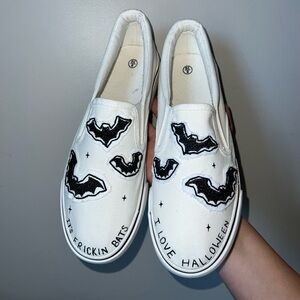 Slip on shoes. Embroidered bat designs